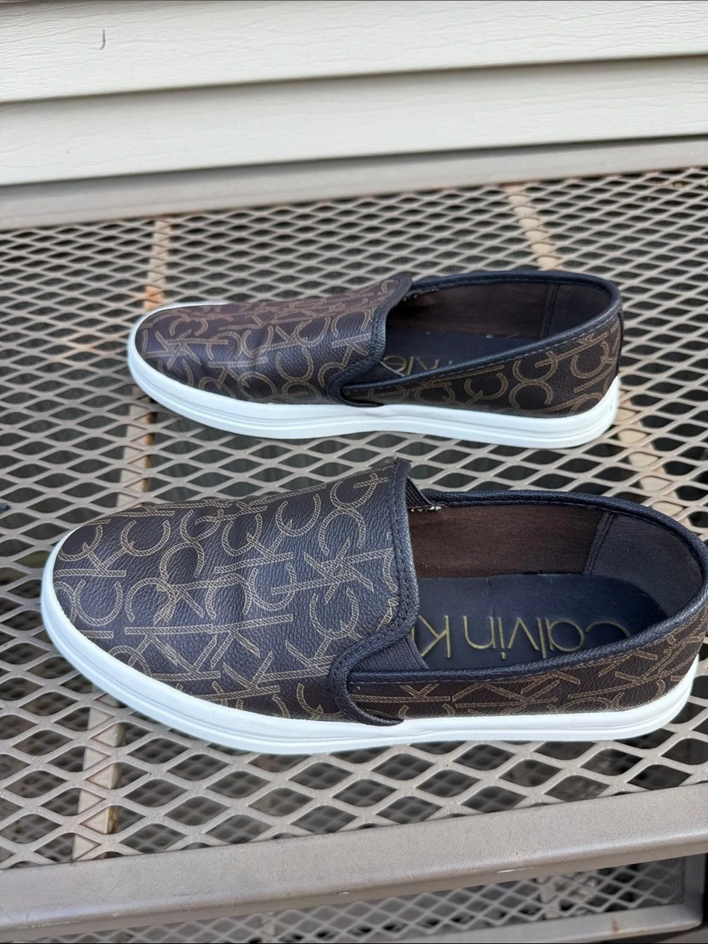 Calvin Klein Women's Black Logo Slip-On Loafer with White Sole